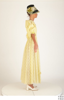  Photos Woman in Historical Civilian dress 1 19th century Historical Clothing a poses whole body yellow dress 0007.jpg